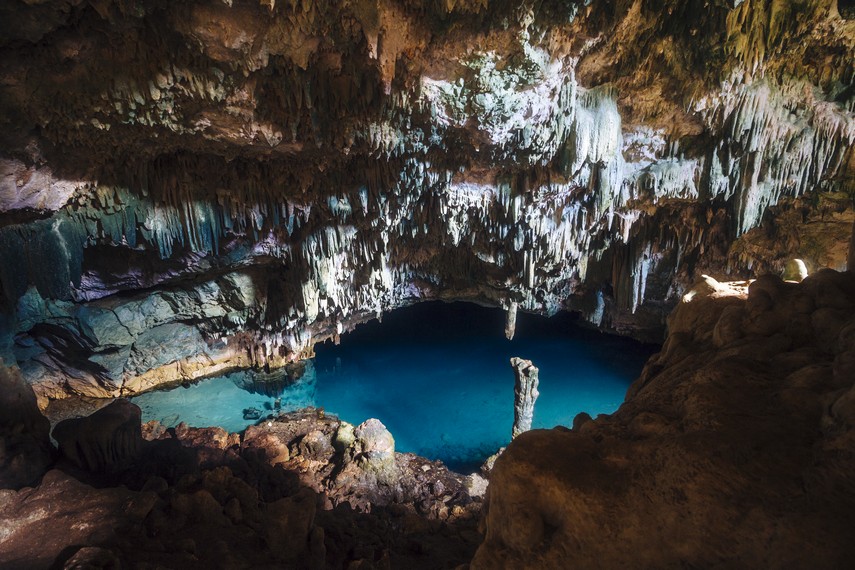 The blue saltwater pool inside Rangko Cave